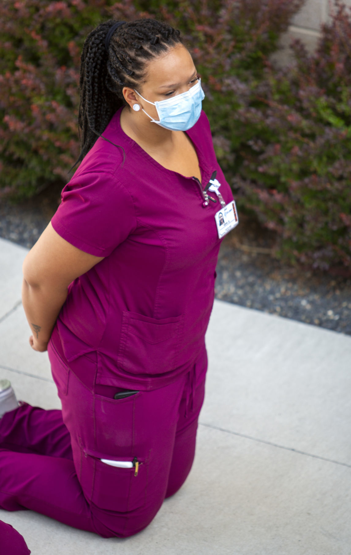 Hospital staff show solidarity with moment of silence